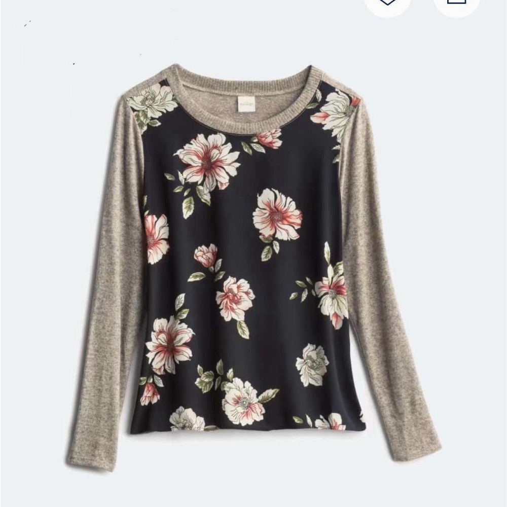 Women’s blouse with beautiful floral detail.